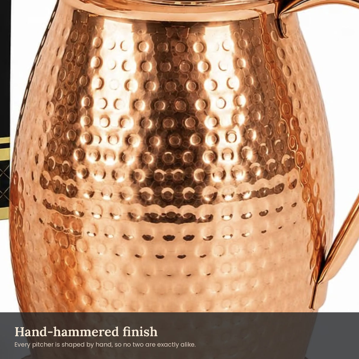 Close-up of the hand-hammered finish on the copper pitcher